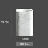 Czteroczęściowy zestaw akcesoriów łazienkowych – Wygląd marmuru